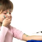 young-girl-receives-chickenpox-vaccine-from-doctor